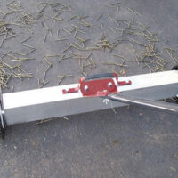 This wheeled, handheld push magnet works on any surface and has an auto release feature for easy cleaning