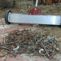 This wheeled, handheld push magnet works on any surface and has an auto release feature for easy cleaning